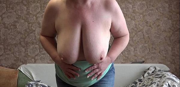  Mom in front of the webcam seduces a stranger and masturbates with him. Mature bbw undressing, shaking big tits, fat booty, fingering hairy pussy.